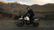 A rider on an adventure motorcycle. A rider on an adventure motorcycle.