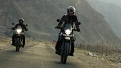 A rider on an adventure motorcycle. A rider on an adventure motorcycle.