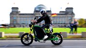 Man rides eRockit electric motorcycle at speed through a German city Man rides eRockit electric motorcycle at speed through a German city