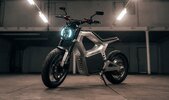 Sondors Metacycle electric motorbike parked stationary on kickstand in well-lit warehouse Sondors Metacycle electric motorbike parked stationary on kickstand in well-lit warehouse