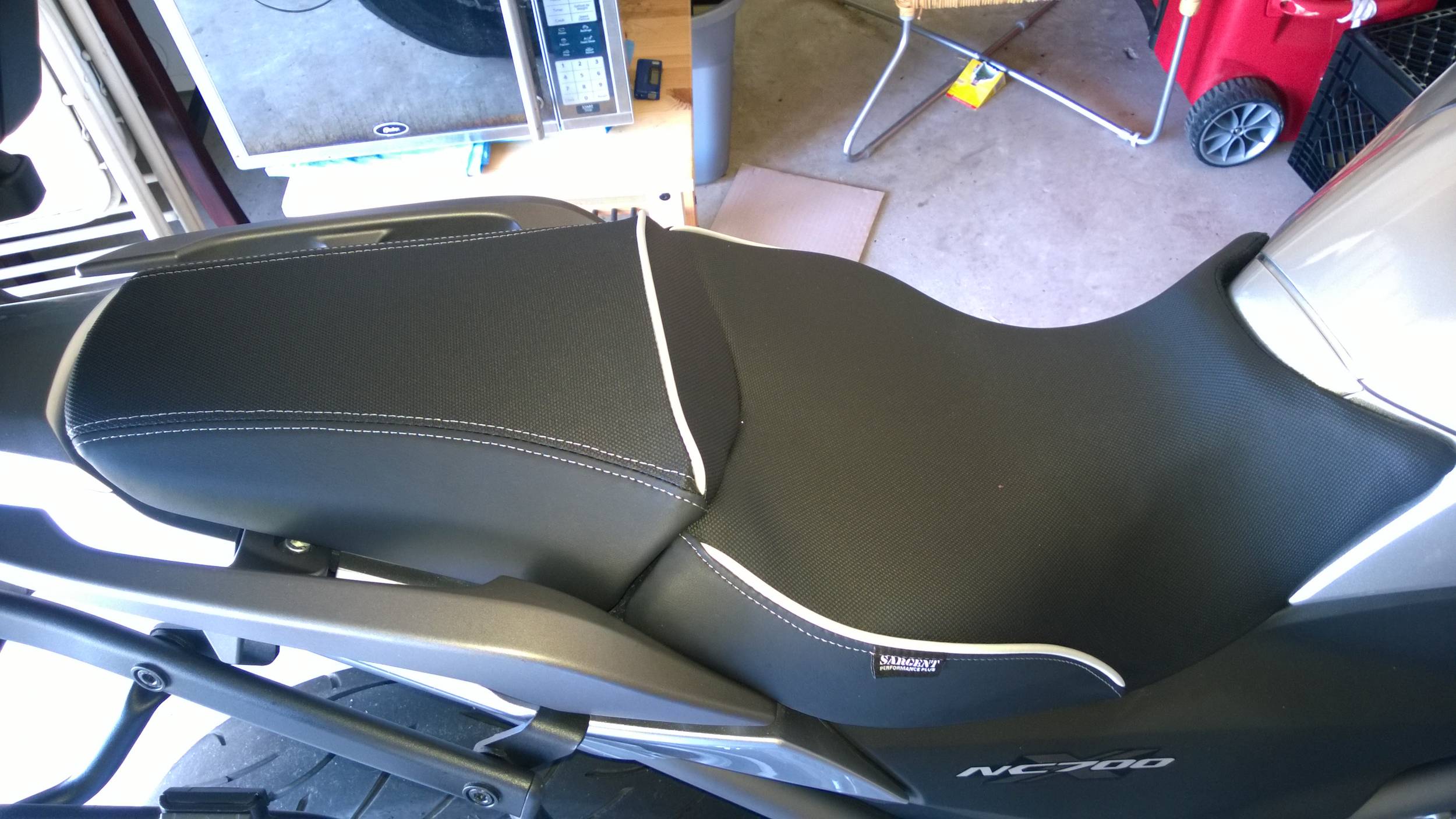 Seat and passenger seat cover